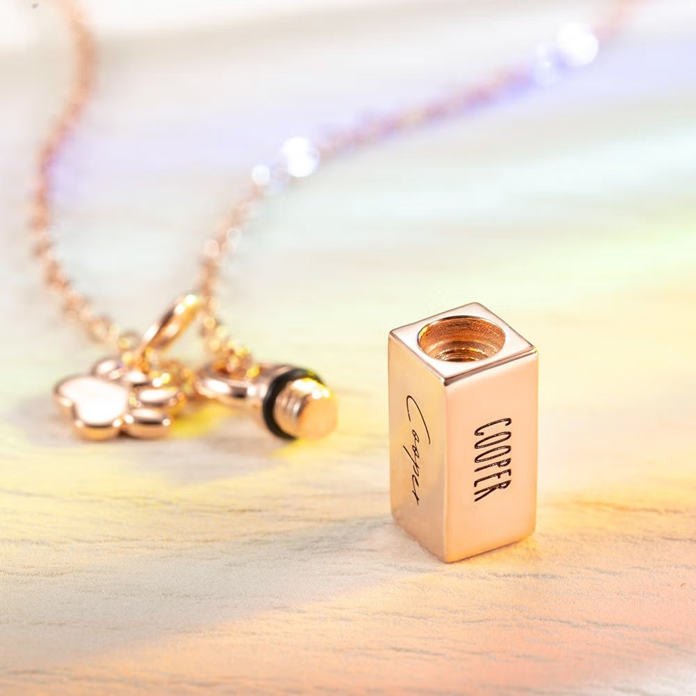 Tiny urn necklace with screw opening for cremation ashes