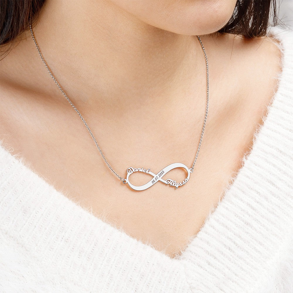 Woman wearing personalized silver two name infinity necklace