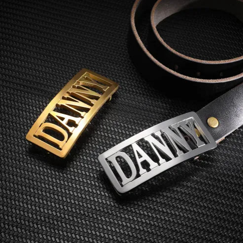 Personalized engraved belt buckles with name 'DANNY' in gold and silver, custom jewelry gift