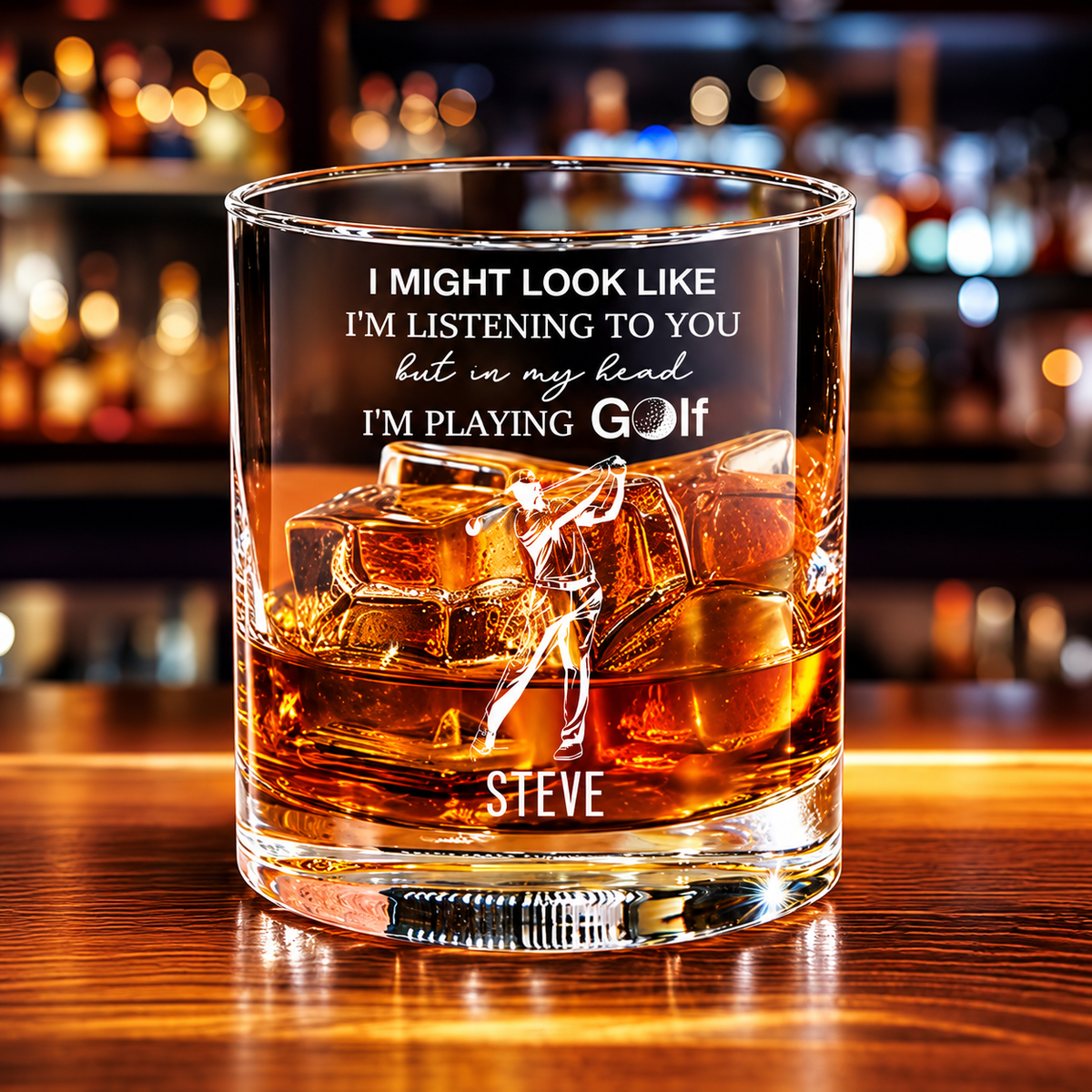 Personalized golf whiskey glass with engraved golfer design and custom name at a bar