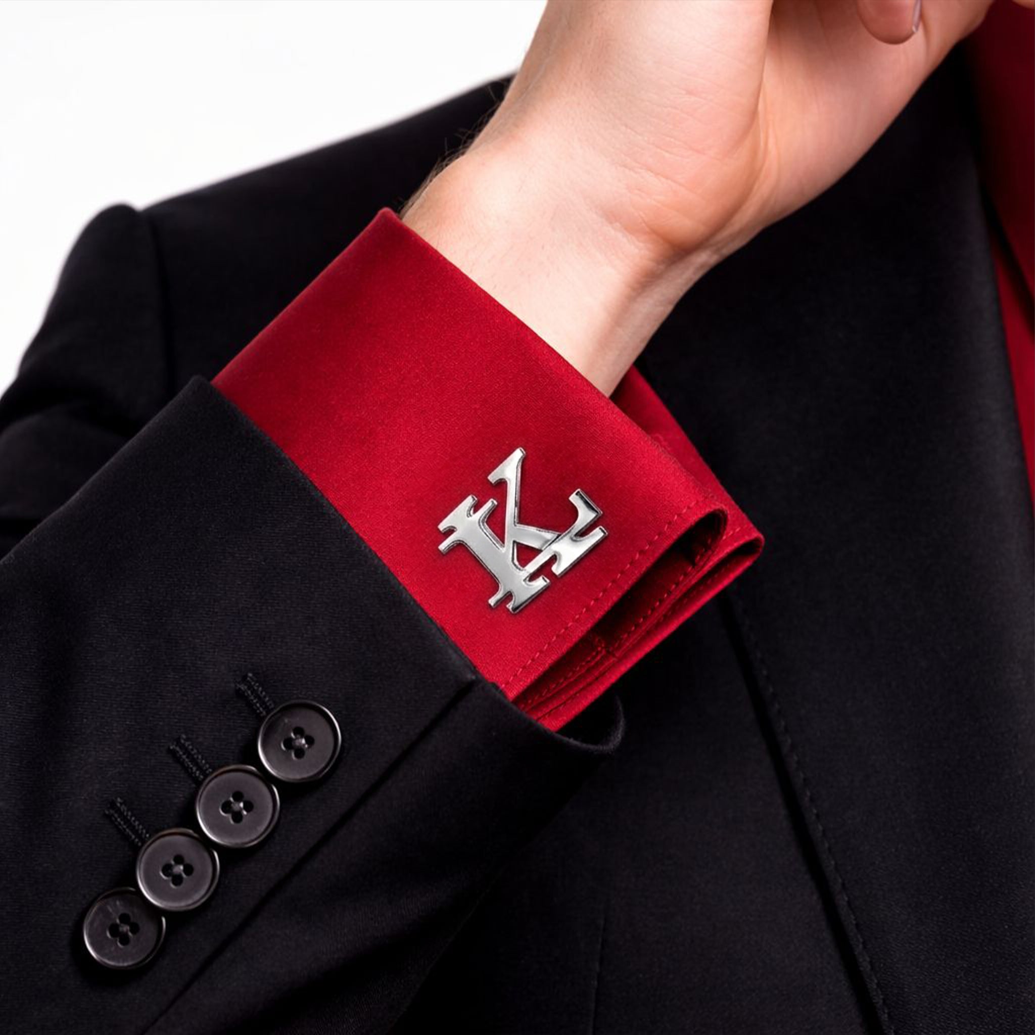 Custom two-letter monogram cufflinks in a polished silver finish