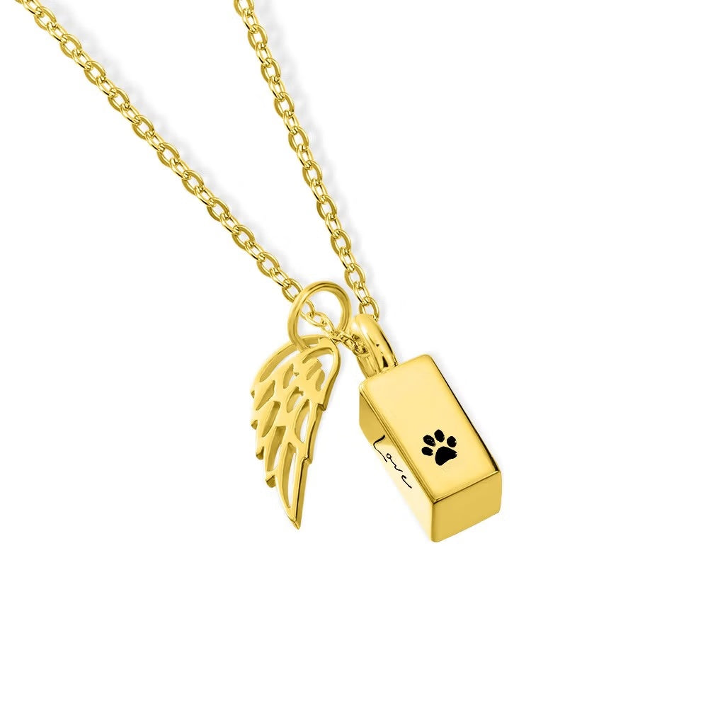 Gold urn necklace for ashes with angel wing and paw print charm