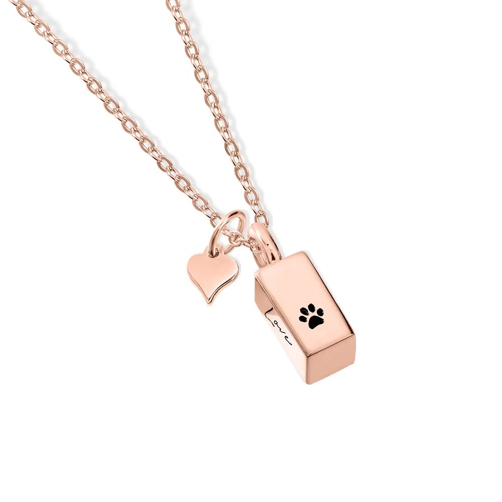 Rose gold urn necklace for ashes with heart and paw print charm