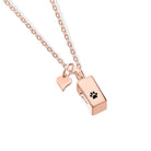 Rose gold urn necklace for ashes with heart and paw print charm