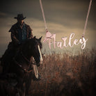 Personalized cowgirl name necklace shown with a Western horse and rider background