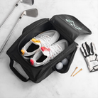 Open golf shoe bag showing spacious interior with golf shoes and accessories
