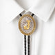 Custom bolo tie with gold letter J on ornate silver medallion, braided black cord, worn on white shirt