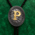 Personalized bolo tie with gold letter P on ornate silver pendant, custom engraved jewelry for men