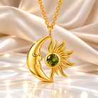 Gold crescent moon and sun necklace with green birthstone