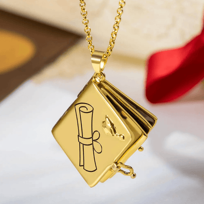 Closed Personalized Graduation Album Necklace in gold, featuring a design with a scroll and cap, ideal for a memorable and personalized graduation gift.