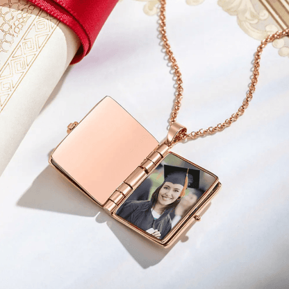 Open Personalized Graduation Album Necklace in rose gold, displaying a custom graduation photo inside, perfect for a memorable and personalized graduation gift.