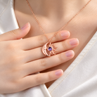 Rose gold moon and sun birthstone necklace with purple stone