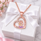 Rose gold crowned unicorn heart necklace with personalized name on gift box