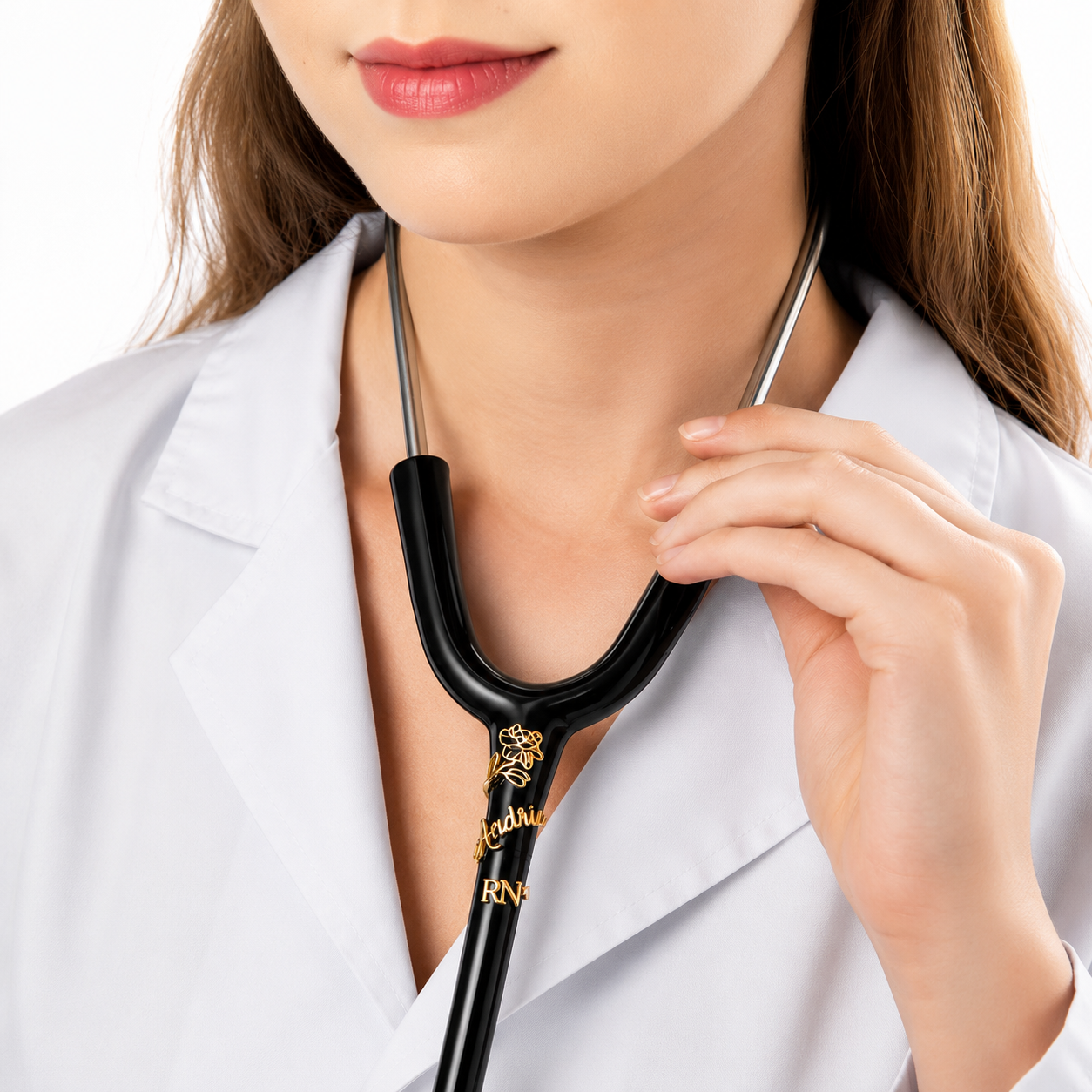 Healthcare professional wearing a personalized gold stethoscope name tag