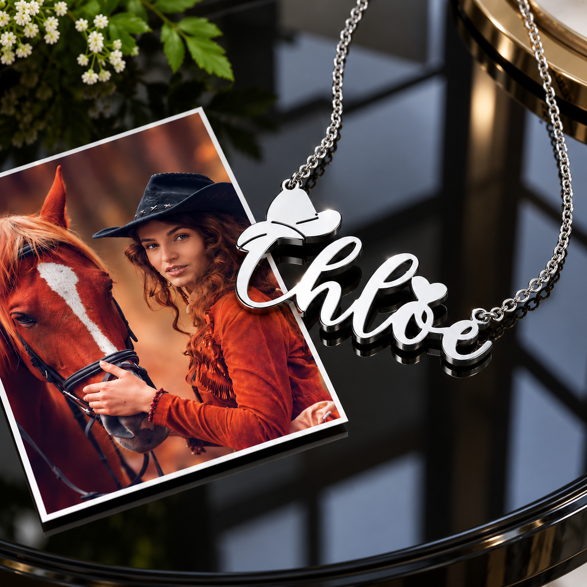 Silver custom name necklace with cowboy hat and heart in a Western lifestyle setting
