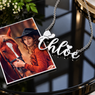 Silver custom name necklace with cowboy hat and heart in a Western lifestyle setting