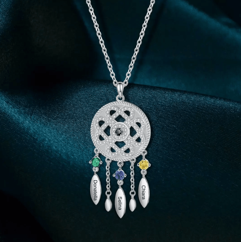 Silver pendant necklace with intricate filigree design and colored gemstones named Daniella, Selina, Sahar, Chiara.