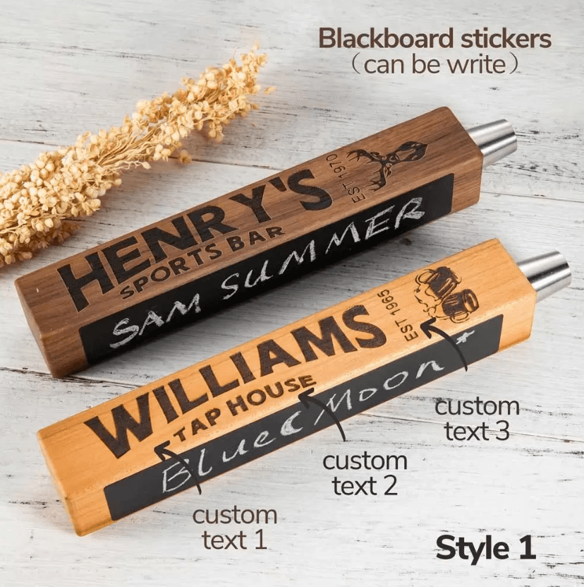 Two custom beer tap handles with personalized engraving and blackboard stickers, labeled "Henry's Sports Bar" and "Williams Tap House," with writable text areas.