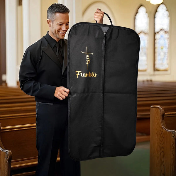 Personalized black garment bag with gold 'Faith Franklin' embroidery, ideal for custom gifts and special occasions.