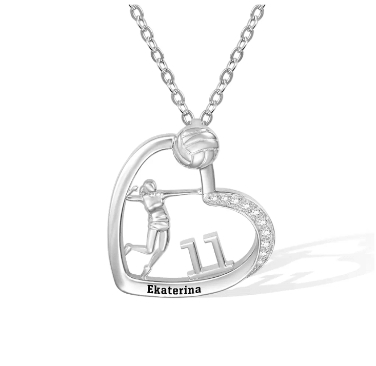 A silver heart-shaped volleyball-themed necklace featuring a player, the number 11, and the name Ekaterina, with a diamond-accented curve.