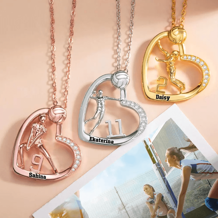 Three volleyball-themed necklaces in rose gold, silver, and gold, each featuring a player's figure, number, and name: Sabina (9), Ekaterina (11), Daisy (2), with a volleyball scene in the background.