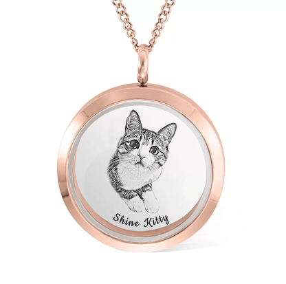 Rose gold locket necklace with a black and white image of a cat named 'Shine Kitty' engraved on the front