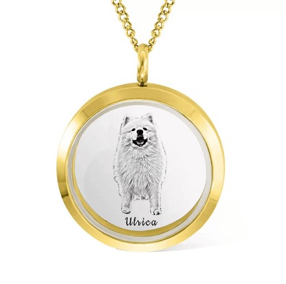 Gold locket necklace featuring a black and white engraved image of a dog named 'Ulrica