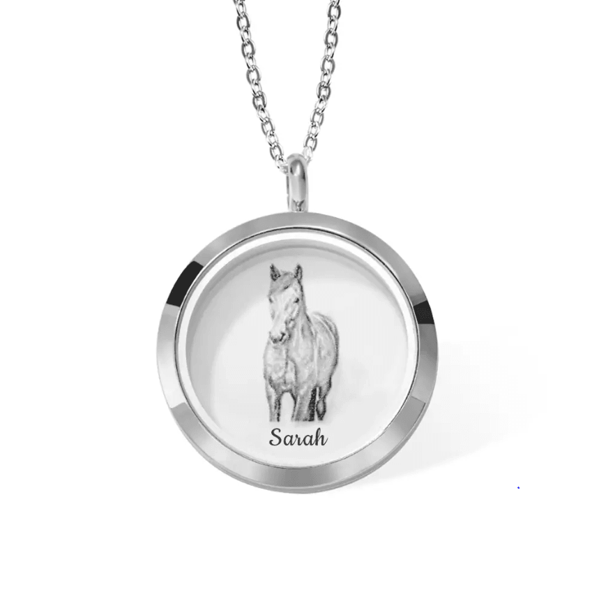 Silver locket necklace with an engraved image of a horse named 'Sarah'