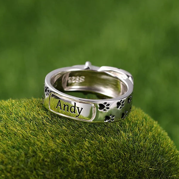 Personalized silver ring with engraved name Andy and paw prints, perfect for pet lovers and custom gifts