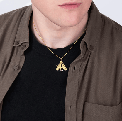 Man wearing a gold Personalized Hockey Goalie Necklace featuring custom engravings with a name and jersey number. Ideal for hockey and ice hockey enthusiasts.