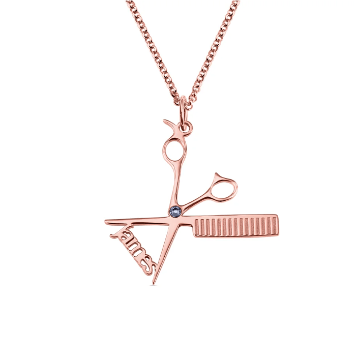 Rose gold personalized hairdresser necklace with scissors and comb pendant and the name 'James.