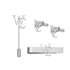 A set of silver men's accessories featuring a tie clip, lapel pin, and cufflinks with an interlocking "WC" monogram design.