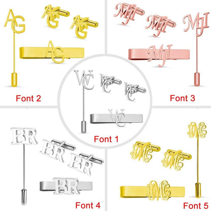 A selection of men's accessories sets with different monogram designs in various fonts. Includes tie clips, lapel pins, and cufflinks in gold, silver, and rose gold.