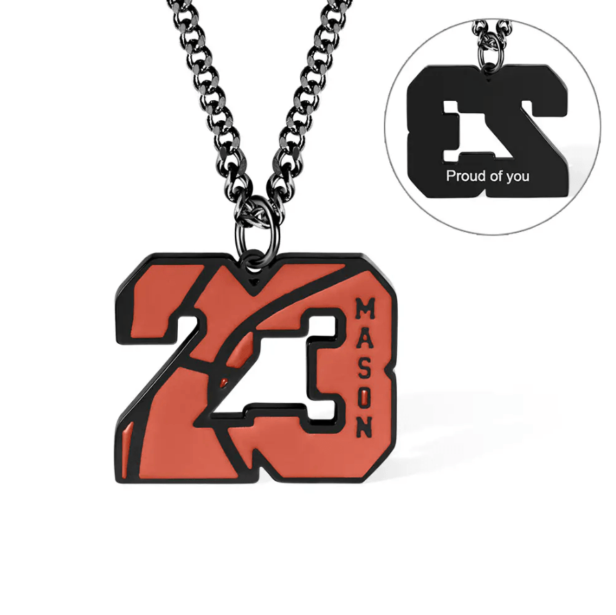 A basketball-themed pendant featuring the number "23" with the name "Mason" engraved on it, hanging on a chain, with an inset showing "Proud of you" on the back.