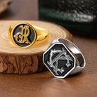 Gold and silver tone personalized double initials signet rings with black engraved monogram faces.