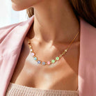 Personalized colorful letter and heart beaded necklace worn with casual outfit