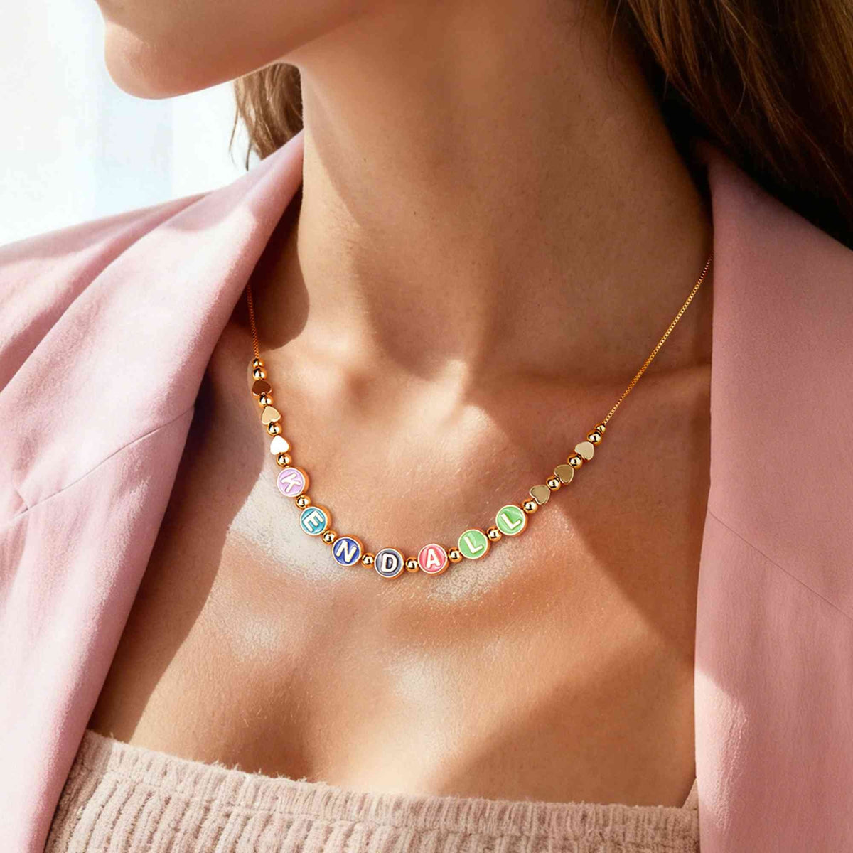 Personalized colorful letter and heart beaded necklace worn with casual outfit
