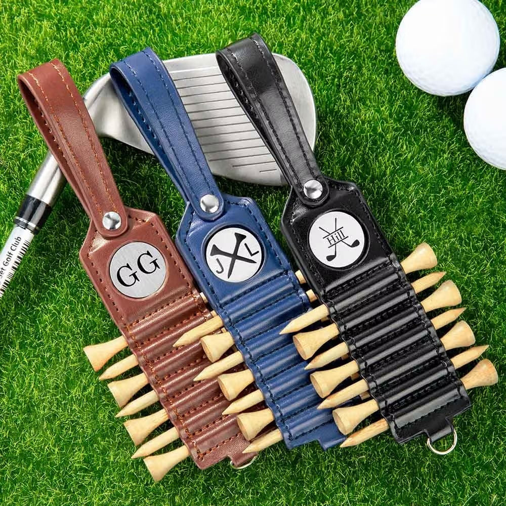 Personalized leather golf tee holders with engraved monograms and golf tees