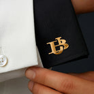 Personalized gold interlocking initials cufflinks shown on a formal shirt cuff