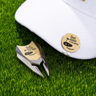 Personalized Best Dad golf divot tool and removable ball marker beside white golf cap