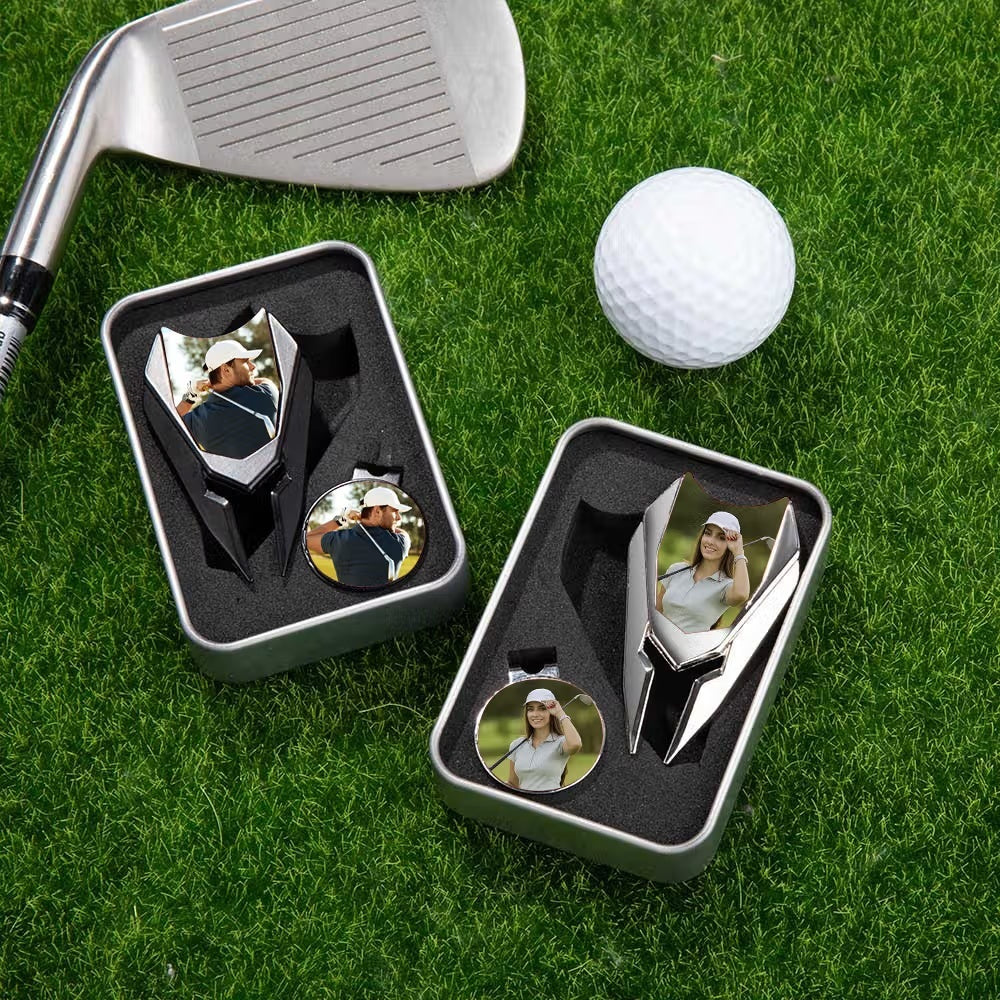 Custom photo golf divot tool gift sets displayed with golf club and ball on grass