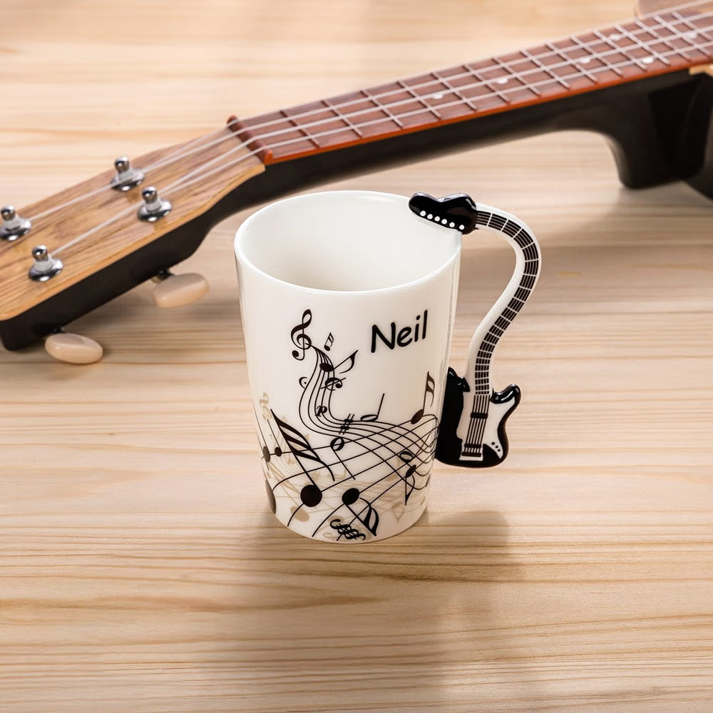 Personalised guitar handle ceramic mug with custom name and black guitar-shaped handle