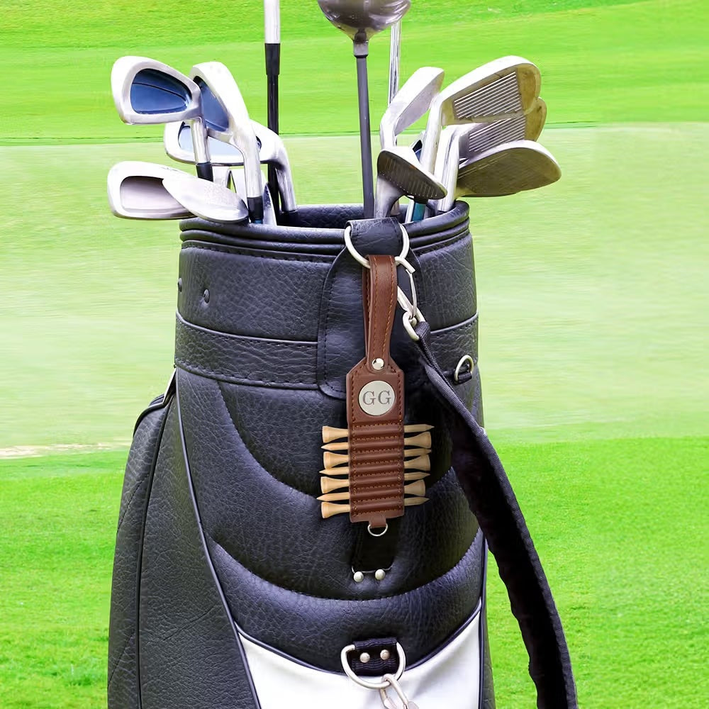 Custom golf tee holder attached to golf bag with personalized engraving