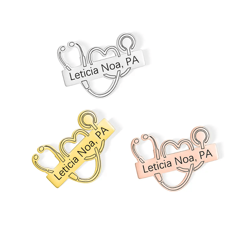 Three Personalized Medical School Graduation Lapel Pins in silver, gold, and rose gold with custom stethoscope designs, featuring engraved names.