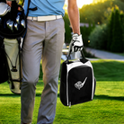 Golfer carrying personalized black and white golf shoe bag on the golf course
