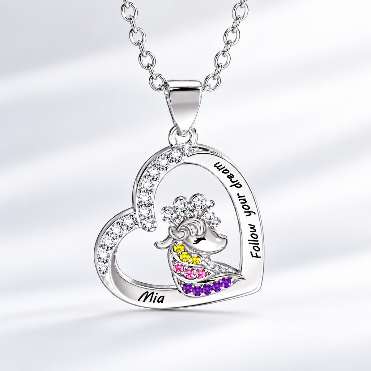 Personalized silver crowned unicorn necklace with asymmetrical heart pendant