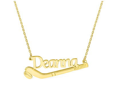A gold necklace with the name "Deanna" elegantly scripted, featuring a hockey stick and puck design, displayed on a white background.
