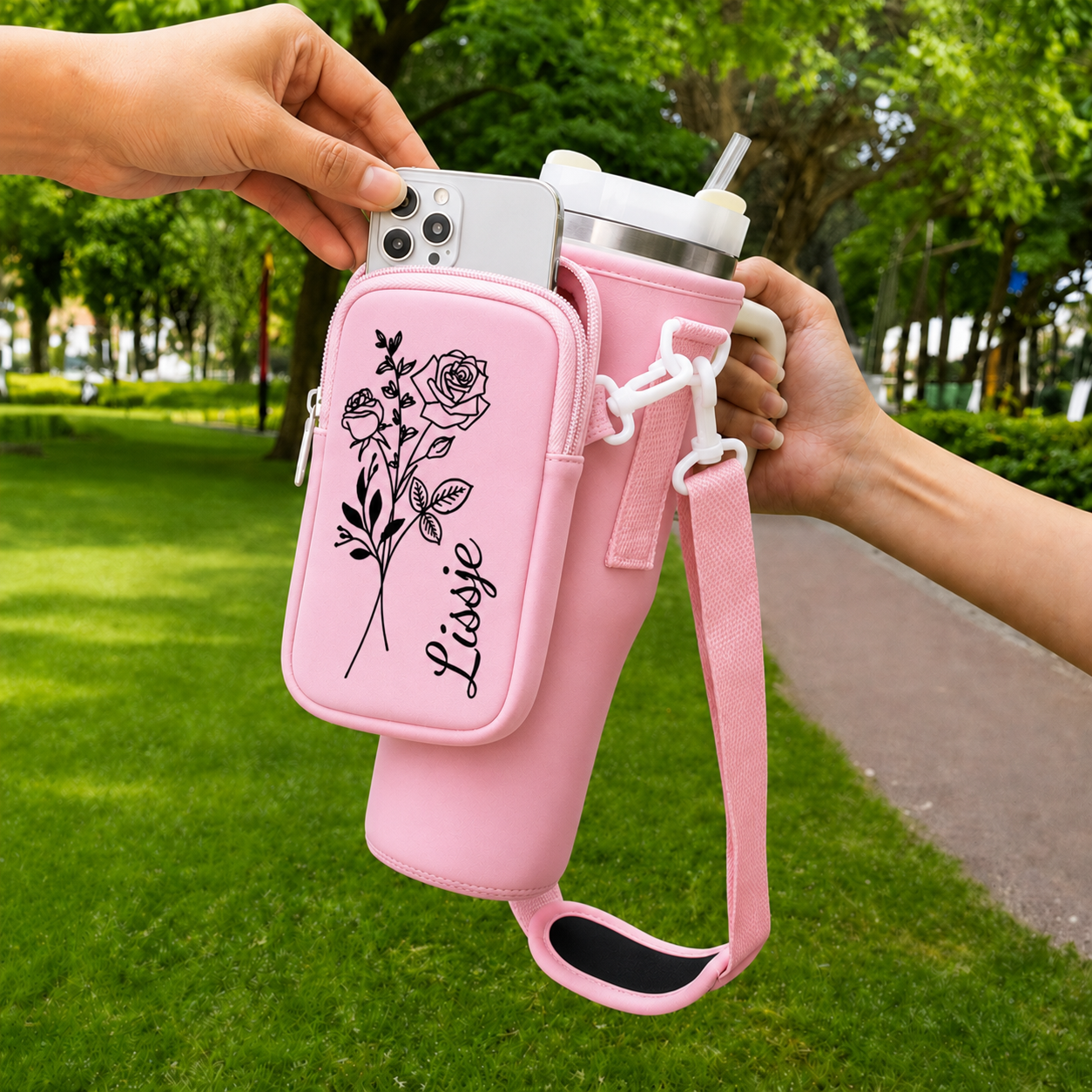 Personalized pink 40 oz tumbler carrier with phone storage pouch for hands-free carrying