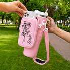 Personalized pink 40 oz tumbler carrier with phone storage pouch for hands-free carrying