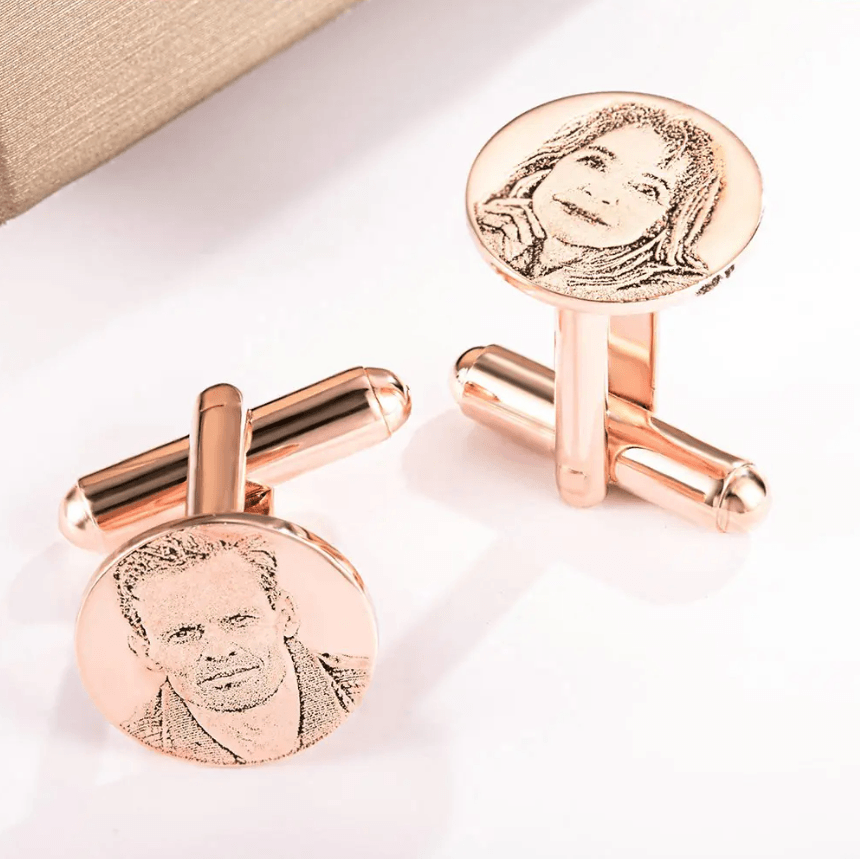 Rose gold cufflinks featuring engraved portraits of a man and a woman.